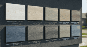 A diverse display of textured Cedarmill fiber-cement siding planks from the James Hardie Statement Collection, specifically for Alberta, similar in texture to those seen in image_19.png, mounted on a grey facade of a Calgary home for James Hardie siding installation.